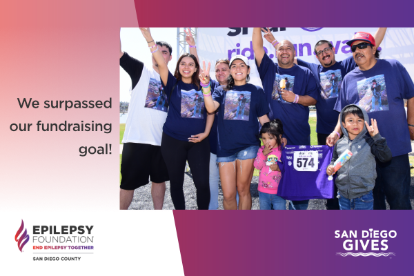 Photo of a family in purple t-shirts, on a purple gradient background. Text with photo says, "We surpassed our fundraising goal!" Logo of Epilepsy Foundation of San Diego County in the bottom left corner. Logo of San Diego Gives in the bottom right corner.